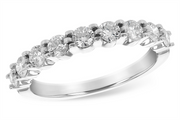 The Allison Kaufman 14k white gold wedding band showcases 0.75ct of natural diamonds, with seven round stones prong set in a sparkling row along the top.