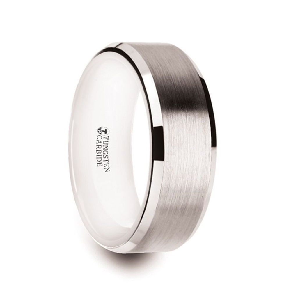 The ANTARES White Tungsten Brushed Center Men’s Wedding Ring with Polished edges by Thorsten features a sleek and modern design. Crafted from shiny tungsten carbide, it has a brushed silver finish with polished beveled edges. The smooth inner band is engraved with "Tungsten Carbide," adding a touch of sophistication to this stylish men's wedding ring.
