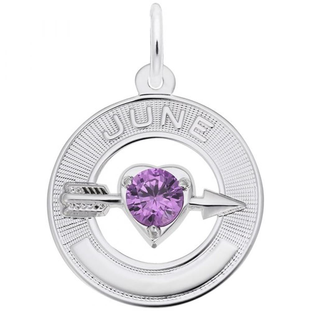 The Rembrandt Charms June Love Birthstone Charm, crafted from sterling silver, showcases a circular pendant with "JUNE" inscribed at the top. It features an alexandrite-colored stone in a heart setting, intersected by a silver arrow. This charm has a smooth metallic finish and includes a loop at the top for attaching to a chain.