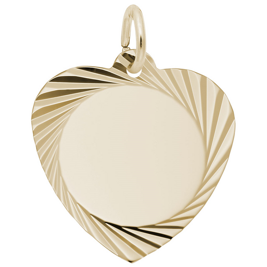 The Rembrandt Charms Medium Diamond Faceted Heart Charm Gold Plated features a radiant design with a shiny, gold-plated finish. The heart-shaped pendant boasts a patterned border of diagonal grooves radiating outward from its smooth central section, and includes a small loop at the top for easy attachment to any necklace or bracelet.