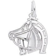 The Rembrandt Charms Horse Head with Horseshoe Charm is a sterling silver pendant showcasing a horse's head in profile, encircled by a detailed horseshoe design featuring several small rectangular marks. This charming piece also includes a finely crafted bridle on the horse and a small loop at the top for easy attachment to a chain or bracelet.
