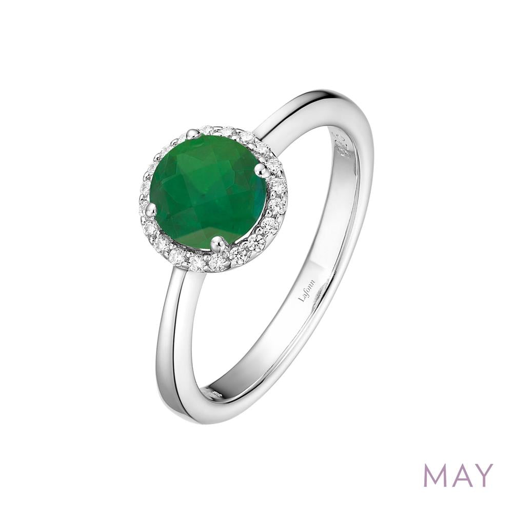 The product is the May Birthstone Ring by Lafonn, featuring a silver band adorned with a central, round green emerald beautifully encircled by small, clear diamonds. In the bottom right corner of the image, the word "MAY" emphasizes this breathtaking May birthstone.