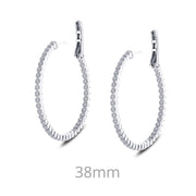 A pair of 1.23cts Diamonds Hoop Earrings by Lafonn, featuring sterling silver inside out hoops encrusted with small, round simulated diamonds along their outer edges. The image includes a label at the bottom that reads "38mm," indicating the diameter of the earrings. The earrings are shown against a plain white background.