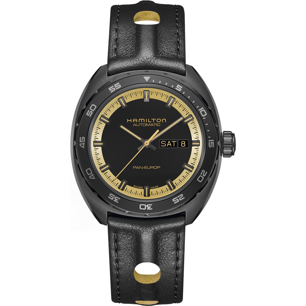 The Hamilton American Classic Pan Europ Day Date Automatic Men's Watch - 42mm features a black round dial with gold hour markers and hands. The dial is inscribed with "HAMILTON AUTOMATIC" and includes a day and date display at the 3 o'clock position. Inspired by retro aesthetics, this wristwatch comes with a black leather strap adorned with gold accents.