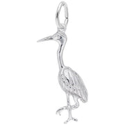 The Rembrandt Charms Heron Charm, crafted from polished sterling silver, is intricately shaped to resemble a heron with detailed feather engravings and a long beak. This elegant charm features a small loop at the top for easy attachment to a necklace or bracelet, showcasing its sleek and refined design.