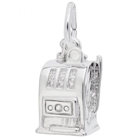 The Rembrandt Charms Slot Machine Charm in sterling silver is a small, intricately detailed piece resembling a slot machine. It features a handle on the side and three diamond-like stones in the display area for a realistic appearance, and includes a loop at the top for easy attachment.