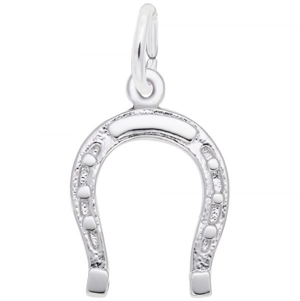 The SS-Horseshoe charm by Rembrandt Charms, a gleaming silver pendant with intricate engravings, hangs beautifully from a loop. The horseshoe is oriented with the open end facing downwards and stands out strikingly against the plain white background.