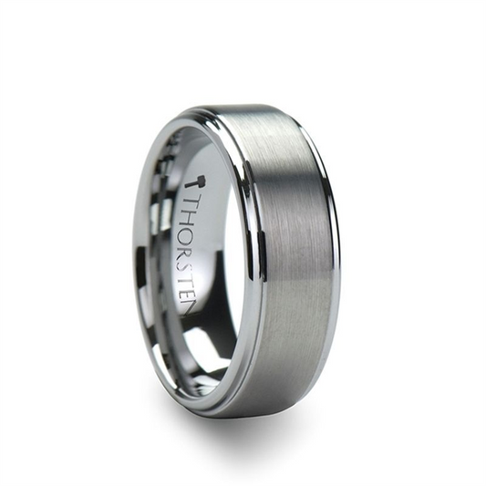 The OPTIMUS Brushed Tungsten Ring by Thorsten boasts a sleek silver design with a modern, minimalist aesthetic. Its brushed center and polished edges create a sophisticated look, and the interior is engraved with the brand name "Thorsten." This 6mm ring is available in size 10.