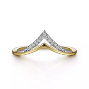 The Gabriel & Co 14K White-Yellow Gold Diamond Chevron Ring showcases a V-shaped design. The apex of the V is embellished with small, sparkling diamonds, providing a striking contrast against the 14K white-yellow gold band. The resulting look is sleek and elegant.