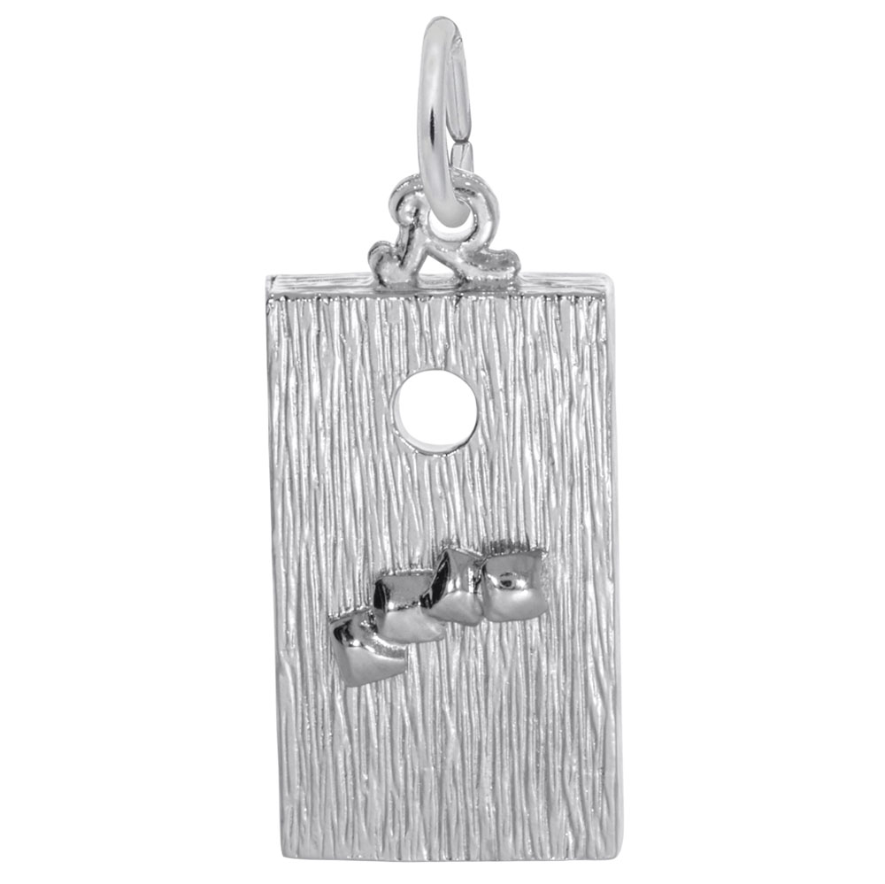 A sterling silver rectangular pendant from Rembrandt Charms, inspired by the Corn Hole Game Charm, showcases a textured surface with a small hole near the top and three small raised shapes clustered at the bottom, complete with an attached loop for a chain.