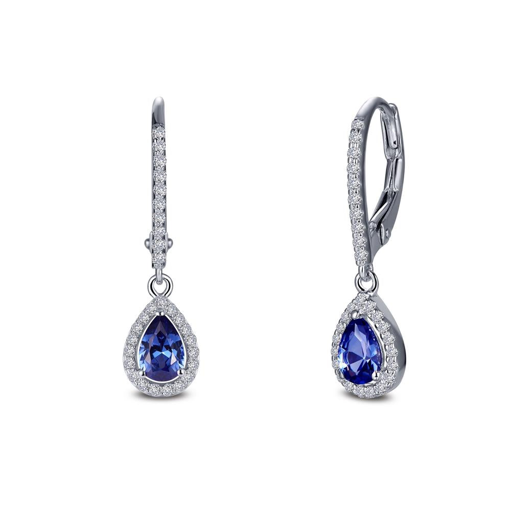 Introducing the Leverback Halo Drop Earrings by Lafonn: a pair of elegant teardrop-shaped earrings featuring deep blue gemstones at the center, surrounded by small clear crystals and set in either a sterling silver or white gold frame. The upper part showcases a curved design encrusted with additional clear crystals, making these timeless classics truly shine.