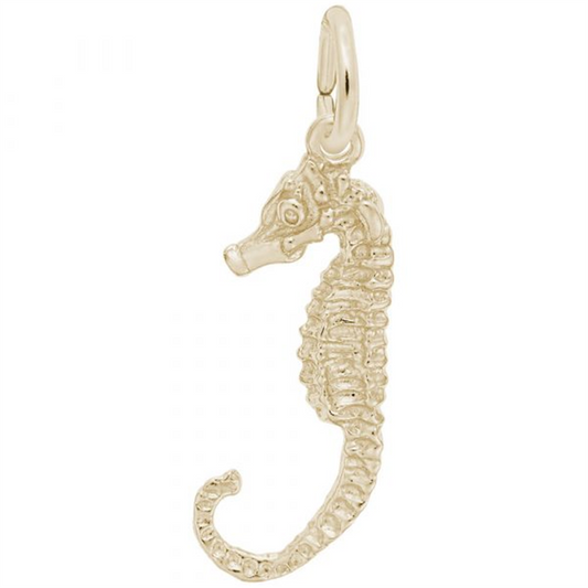 The Rembrandt Charms Seahorse Charm in Gold Plated Sterling Silver exquisitely captures the delicate features of a seahorse, including its curled tail and elongated snout. This intricately detailed piece boasts a small loop at the top for easy attachment to a chain or bracelet.