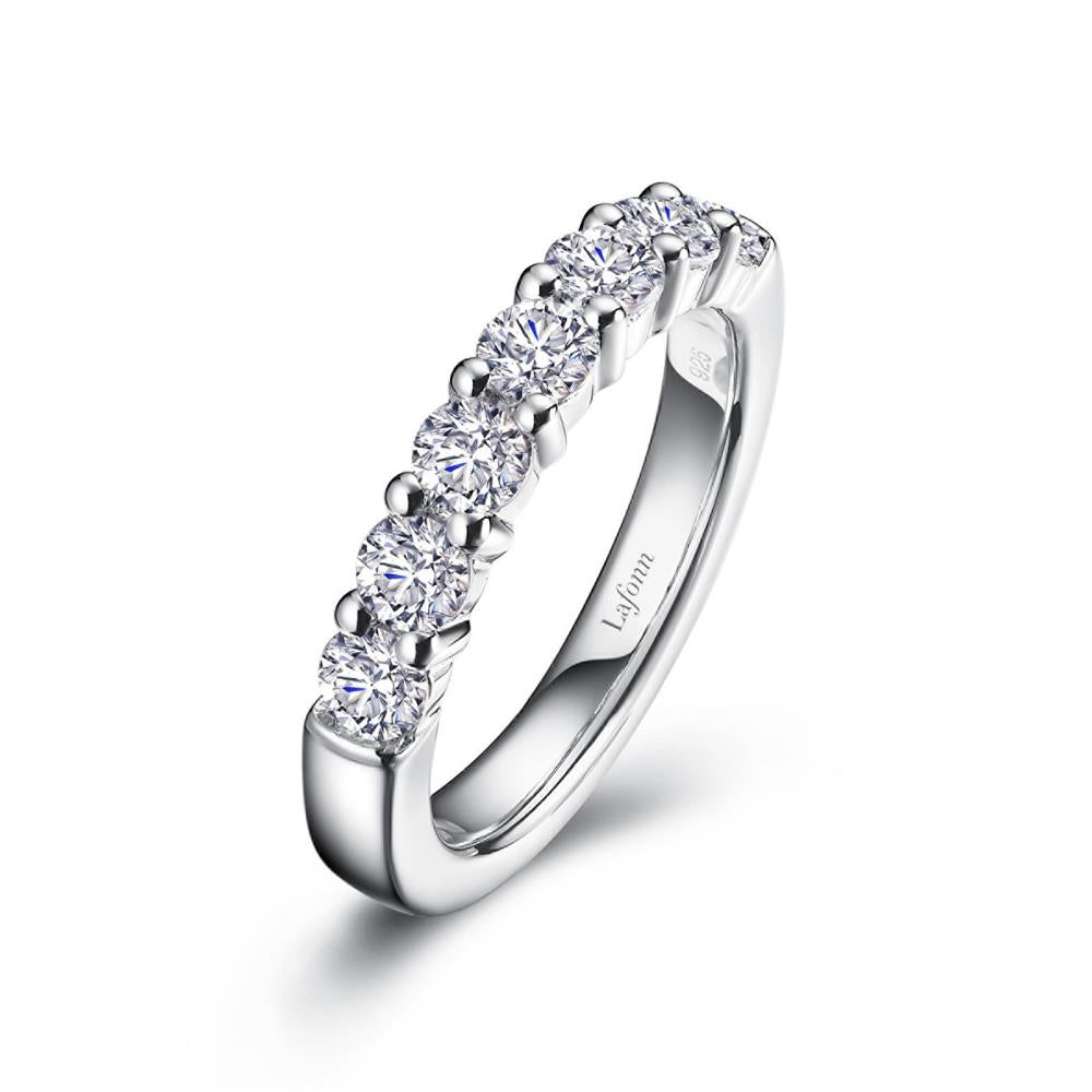 A sleek Half-Eternity Band by Lafonn, crafted from white gold and adorned with a row of round-cut diamonds encircling the top half. The inner band features an engraving of "Lafonn." This exquisite ring catches the light, highlighting the brilliance and clarity of its diamonds.