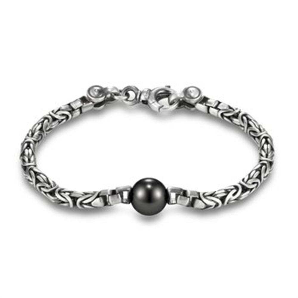 The Mastoloni Pearls Tahitian Pearl on Sterling Silver Chain bracelet features an 8.5" sterling silver chain with a single black Tahitian pearl centerpiece and a secure lobster clasp.