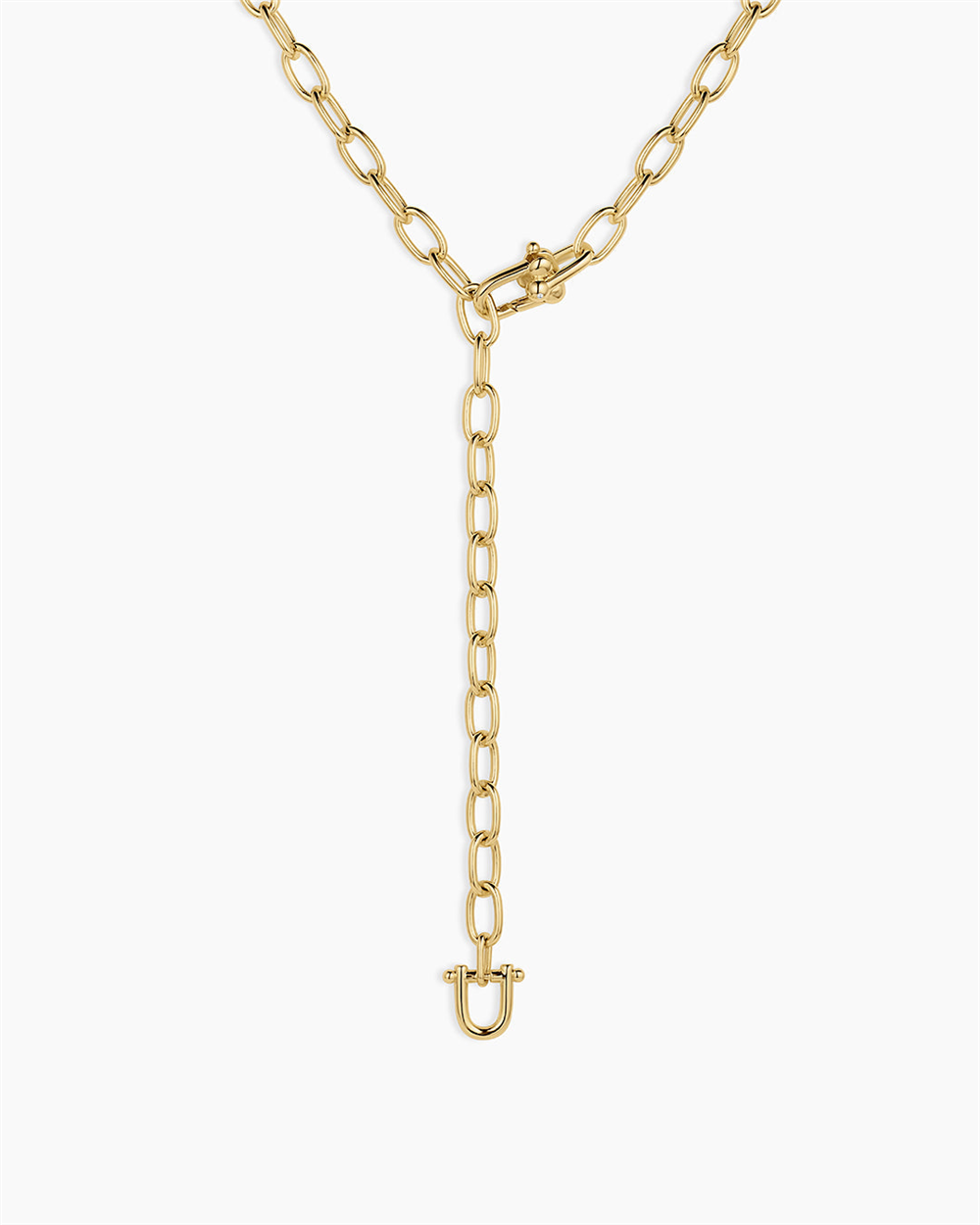 The Gorjana Atlas Lariat is an 18k gold plated necklace with elongated oval links, a vertical hanging chain, and a U-shaped clasp, shown against a plain white background.