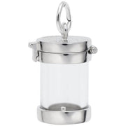 A sleek and polished Empty Capsule Charm in Sterling Silver by Rembrandt Charms, featuring a cylindrical housing with clear glass sides, a hinged lid, and a loop on top for easy attachment to any bracelet or necklace. This fillable charm includes a small lever for effortless opening and closing.