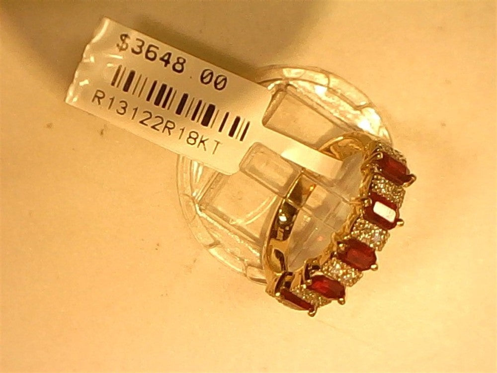 A Ryan Gems Diamond and Ruby station band, size 7 in 18k yellow gold, showcases five rubies with clear stones on a display stand. The price tag reads "$3648.00" and "R13122R18KT.