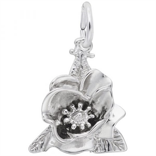 The Magnolia Flower Charm from Rembrandt Charms is beautifully shaped like a bloom, featuring a loop at the top for attaching to a chain. The sterling silver petals are spread open, revealing a delicately crafted center, while small leaves extend from the base of this exquisite charm.