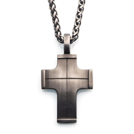 A close-up image of the Gun Metal Plated Cross Pendant with Steel Wheat Chain | INOX by INOX highlights its modern design and brushed finish. The cross pendant features clean lines and slightly beveled edges, giving it a sleek and contemporary appearance, all suspended on a thick gun metal plated steel wheat chain.