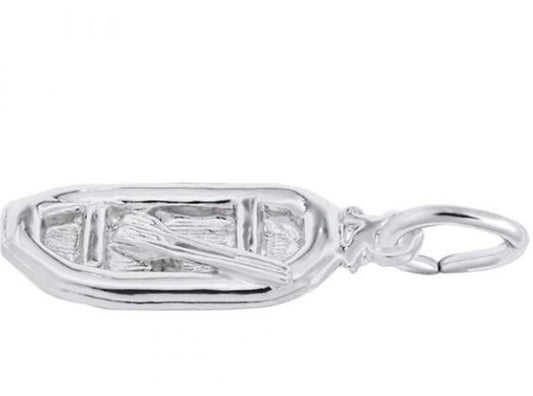 The White Water Raft Charm by Rembrandt Charms is a small, Sterling Silver piece shaped like a detailed rowboat. It features visible oars and seating areas, reminiscent of a white water raft, and includes a loop at one end for attaching to a bracelet or necklace.