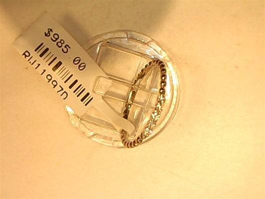A Small Dainty Diamond band by Ryan Gems, crafted in 14k white gold (size 6.75), is shown on a clear stand with a $985 price tag and barcode RU119970 against a light background.