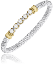Alwand Vahan Jewelry's 4MM PEARL silver bracelet showcases a textured band adorned with pearl beads, each measuring 4mm. The pearls are separated by small diamond-like stones, and the row is elegantly capped with gold decorative accents.