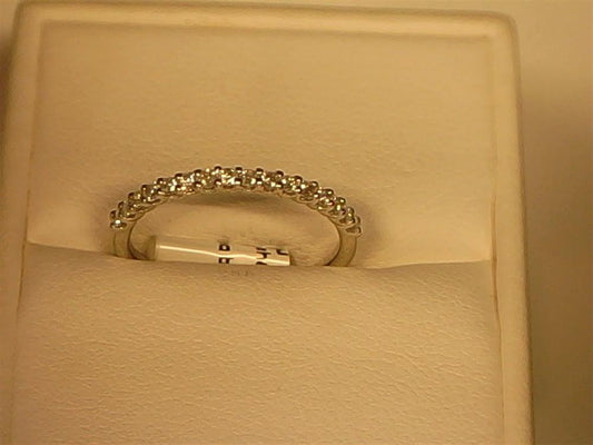 14 K white gold shared prong set
diamond wedding band
serial no S174
