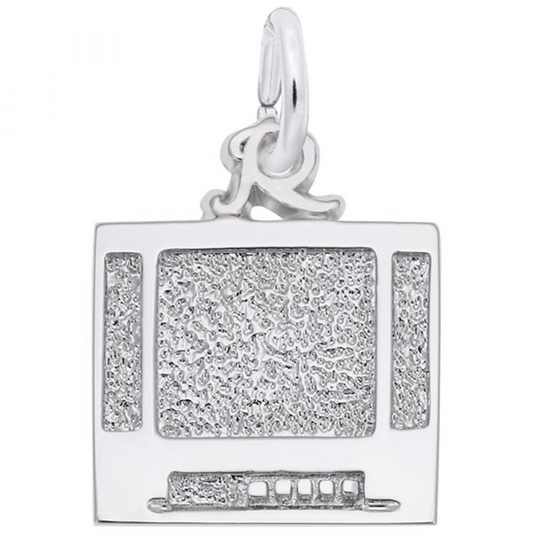 The Rembrandt Charms' Flatscreen TV Charm is a sterling silver pendant shaped like a textured, rectangular retro television. This charm features raised details that suggest the screen texture and knobs, complemented by a loop at the top for easy attachment to a chain or bracelet, offering a delightful nod to pre-flatscreen TV nostalgia.