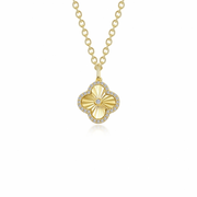 The Lafonn NK CL S.S. GP 0.60 CTW NK 20'' is a gold necklace with a clover-shaped pendant. The pendant features a central gold pattern and is bordered by small, sparkling diamonds, creating an elegant and detailed design. The simple chain complements the intricate GP pendant perfectly.