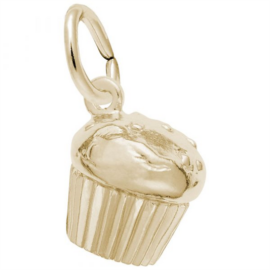 The Muffin Charm by Rembrandt Charms is made from gold-plated sterling silver and features textured details, including a rounded top and a fluted base. It resembles an intricate muffin design and has a small loop at the top for attaching to a bracelet or necklace.