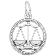 The Libra Charm from Rembrandt Charms is a sterling silver pendant featuring a balanced scale symbol within a circular, rope-like border. This scale, symbolizing justice or Libra, hangs evenly with its trays intact and is meticulously crafted with detailed edges and smooth surfaces. It's the perfect addition to any Rembrandt Charms collection.