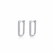 Presenting the W larger rectangle pave hoops by Lafonn – a stunning pair of silver earrings featuring a thin, elongated design. Adorned with small, sparkling diamonds on the outer edge, these hoops exude a sleek and elegant appearance. With their minimalist style, these earrings are perfect for both casual and formal wear.