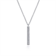 Introducing the Gabriel & Co 14K White Gold Diamond Bar Pendant Necklace, a timeless piece from our Lusso Collection. This exquisite necklace features a silver vertical bar adorned with small diamonds and is paired with a delicate chain that enhances its elegant simplicity. The minimalist design beautifully showcases the sparkling diamonds, making it a perfect addition to any jewelry collection.