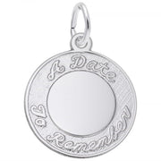 The Rembrandt Charms "A Date to Remember Script Disc Charm" is a round sterling silver charm with a small loop at the top for attaching to a chain. It features an empty circular center and the engraved words "A Date To Remember" around the edge in cursive script, reminiscent of classic Rembrandt Charms.