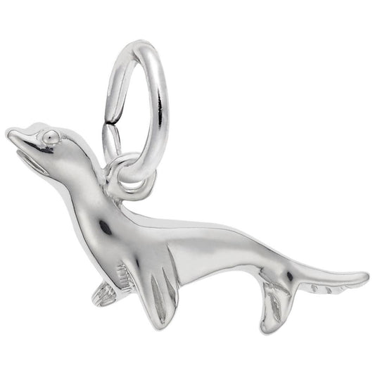 The Seal Charm by Rembrandt Charms is crafted from sterling silver and is designed in the shape of a leaping dolphin. This detailed charm features intricately crafted fins and a smooth body, with a small loop for easy attachment to a necklace or bracelet.