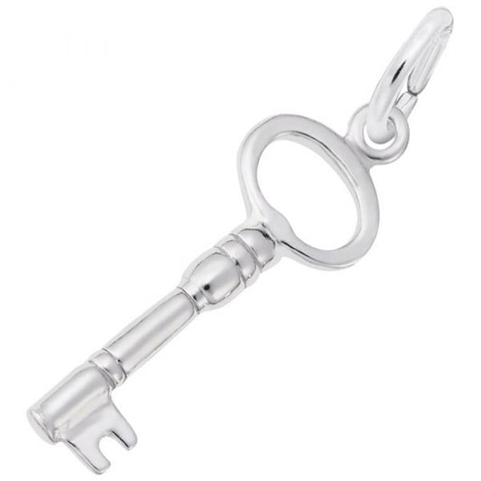The Skeleton Key Charm by Rembrandt Charms is a simple yet elegant sterling silver piece resembling a traditional skeleton key. It features a keyhole, a loop at the top for attaching to a chain or bracelet, and boasts a cylindrical stem with a triangular bit at the end.