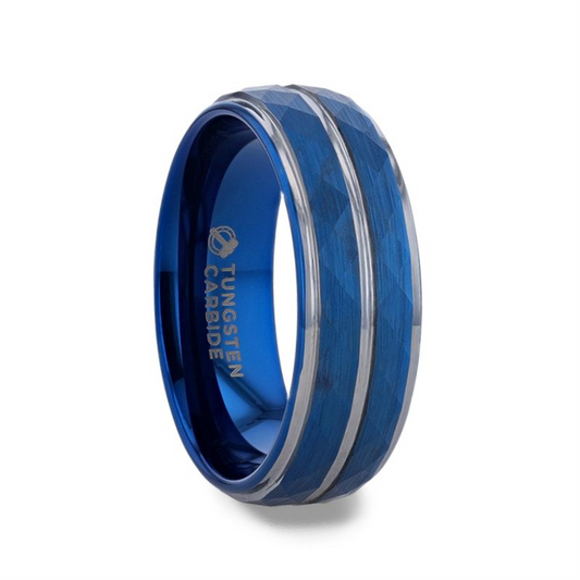 The CARMEL Blue Ion Plated Tungsten Carbide Men's Ring by Thorsten features a faceted design and silver accents. The interior of this 8mm ring is smooth and engraved with "TUNGSTEN CARBIDE" in gold lettering.