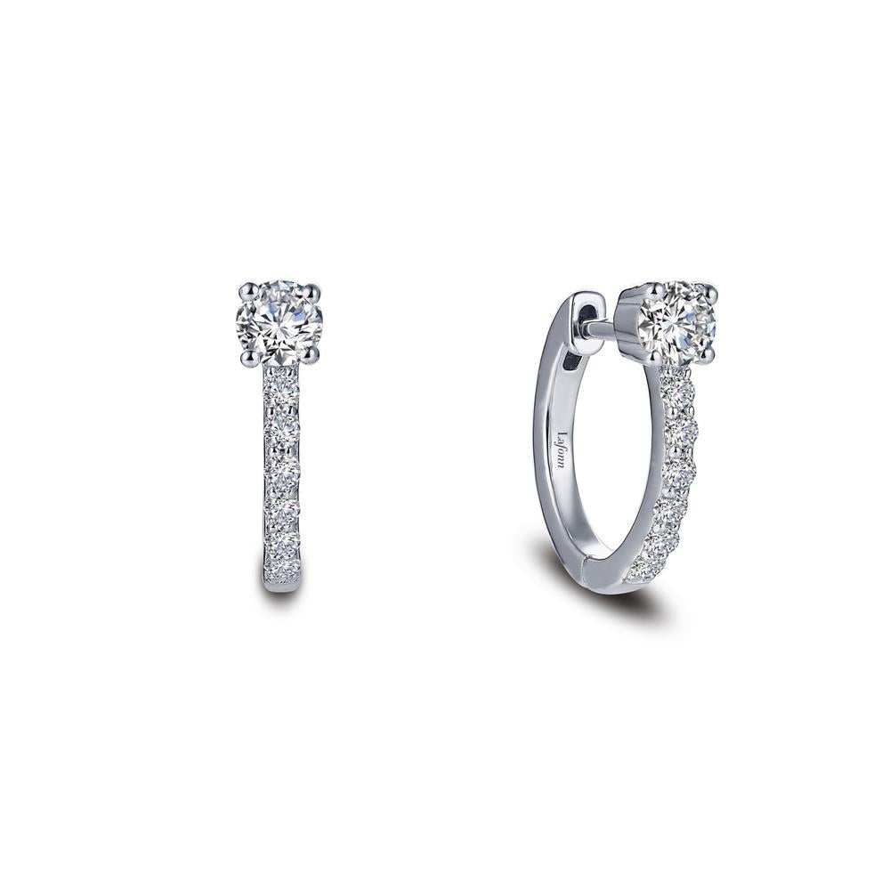 A pair of elegant Lafonn 11 mm Huggie Hoop Earrings, each featuring a row of small shimmering diamonds and a larger round diamond at the center. The earrings are showcased on a white background, highlighting their intricate design and sparkling stones.