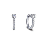 A pair of elegant Lafonn 11 mm Huggie Hoop Earrings, each featuring a row of small shimmering diamonds and a larger round diamond at the center. The earrings are showcased on a white background, highlighting their intricate design and sparkling stones.