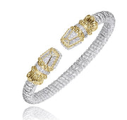 A 6MM band silver cuff bracelet from Alwand Vahan Jewelry, identified by product number 23574D06, features two gold-toned, intricately designed end caps adorned with small gemstones totaling 0.42ct and ribbed detailing along the band.