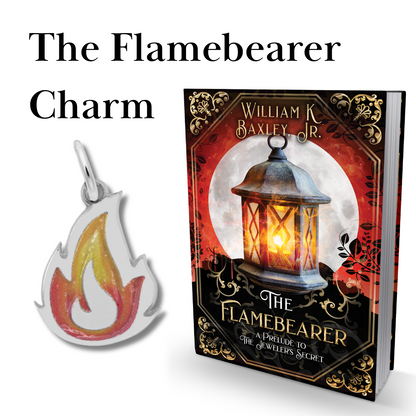 A copy of "The Flamebearer" by William K. Baxley Jr. stands upright beside a Painted Flame Charm in yellow, orange, and red. Text above reads: "Painted Flame Charm | Sterling Silver." Inspired by Rembrandt Charms.