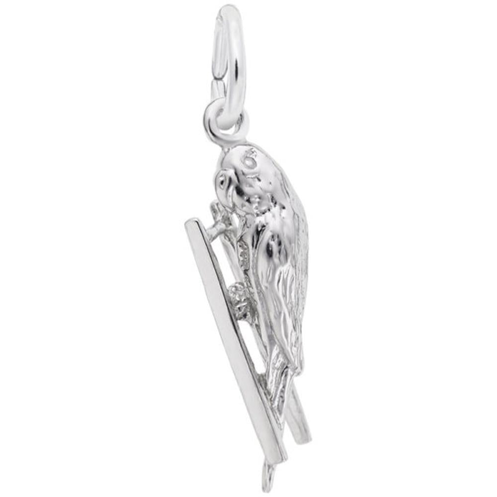 A stunning piece from Rembrandt Charms, the Budgie Bird Charm in sterling silver features an intricately detailed budgie with textured feathers, perched gracefully on a thin, rectangular bar. This charm includes a small loop at the top for easily attaching it to your favorite necklace or bracelet.