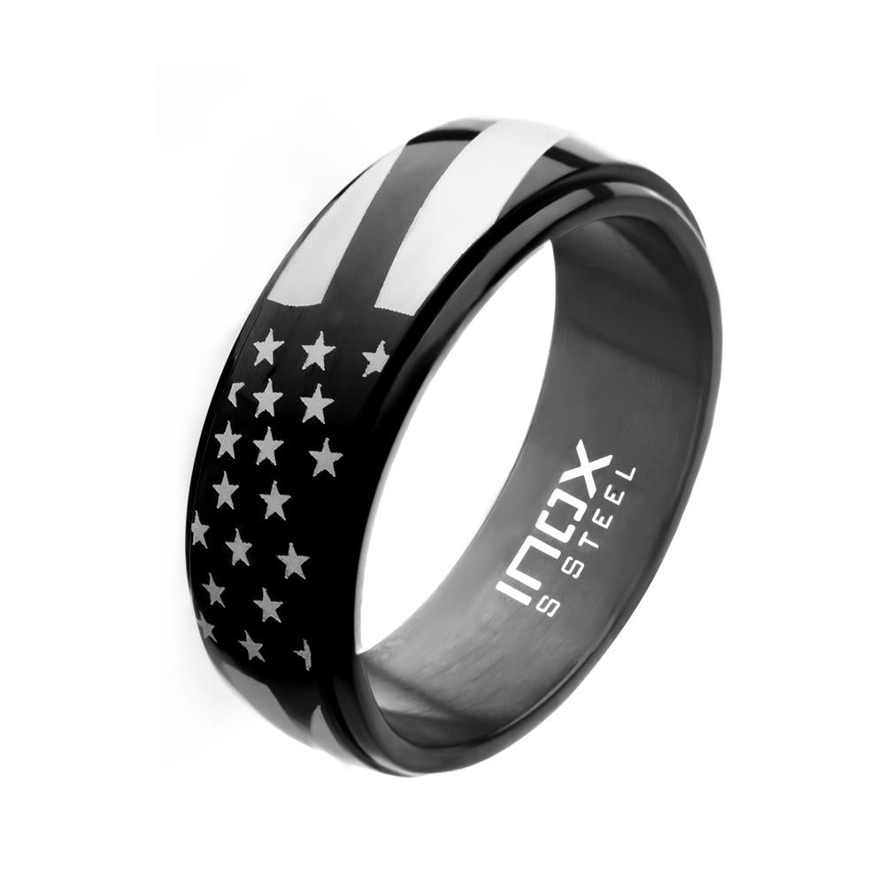The Men's Stainless Steel American Flag Pride Black Plated Spinner Ring by INOX features an American flag design etched on its surface. The stars and stripes shine in white, contrasting against the black background. Inside, "INOX S STEEL" is engraved. This statement piece subtly exudes American flag pride while ensuring durability and style.