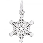 The Snowflake Charm by Rembrandt Charms is crafted from sterling silver and showcases intricate cut-out details with six symmetrical arms. It includes a small hoop at the top, perfect for attaching to a chain or bracelet.