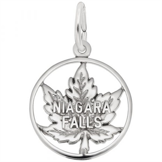 Introducing the Niagra Falls - Sterling Silver Charm by Rembrandt Charms: a beautifully crafted sterling silver pendant featuring a stylized maple leaf encircled within a circular frame. The phrase "NIAGARA FALLS" is prominently displayed across the center of the leaf, making it an exquisite addition to any jewelry collection.