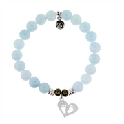 The T Jazelle Blue Aquamarine Gemstone Bracelet features light blue aquamarine beads, silver accents, and two sterling silver charms: a personalized initial disc and a heart-shaped baby feet pendant.