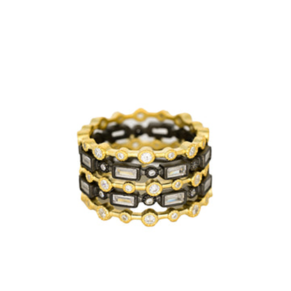 The Freida Rothman YRZR090243B Celestial Geometric 5 Stack ring features black and gold accents with clear gemstones in a celestial style. Displayed on a white background. Available in size 7.