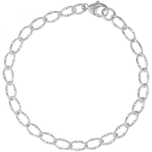 A close-up image features the thin, delicate Charm Bracelet 7 Inch / Sterling Silver by Rembrandt Charms. The bracelet, composed of oval links, is equipped with a small lobster clasp for fastening. Displayed against a white background, this piece radiates elegance and refinement.
