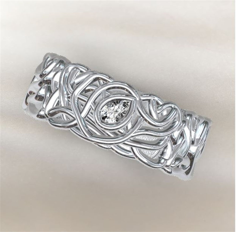 An 8mm wide Gabriel & Co band with a continuous braided and knotted design, displayed on a soft, light-colored background.