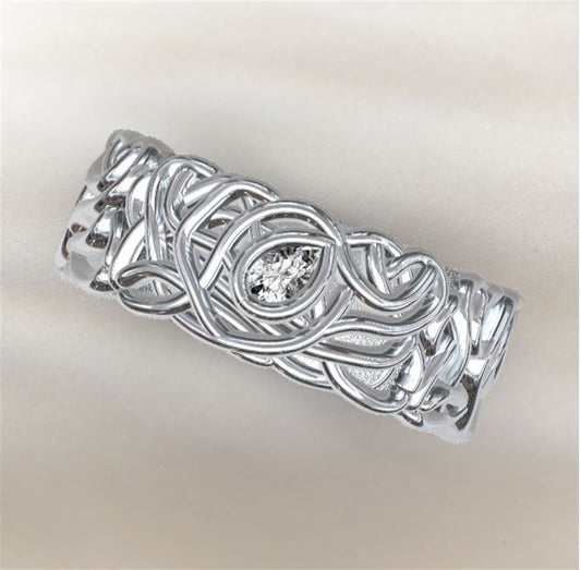 An 8mm wide Gabriel & Co band with a continuous braided and knotted design, displayed on a soft, light-colored background.